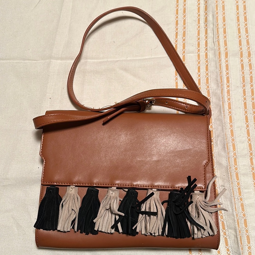 Tan handbag with fringe